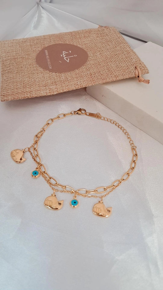 Stainless steel bracelet with five charm - gold