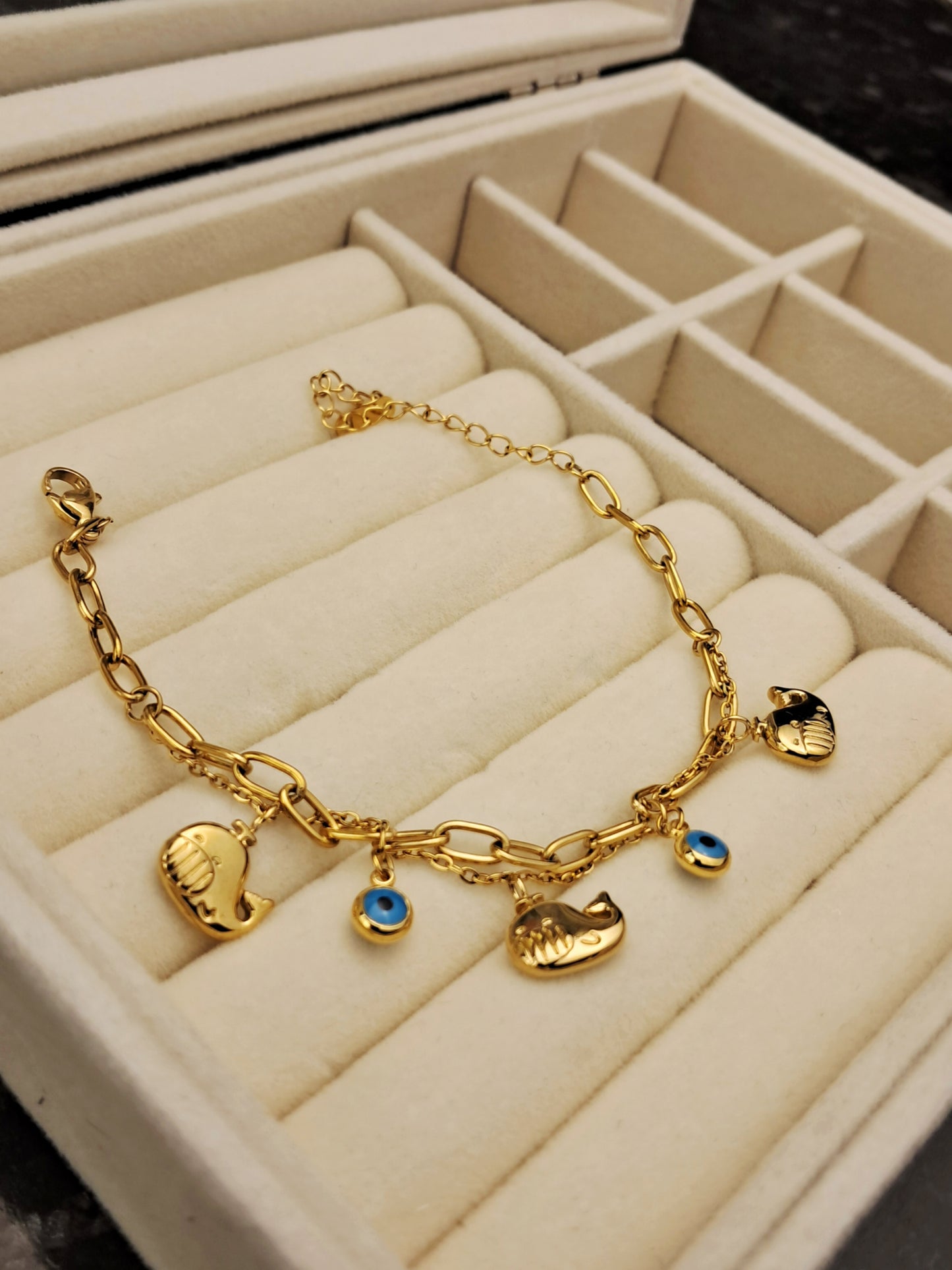 Stainless steel bracelet with five charm - gold