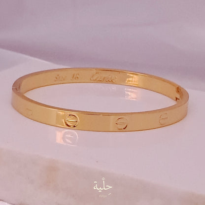 cartier stainless steel bracelet - gold