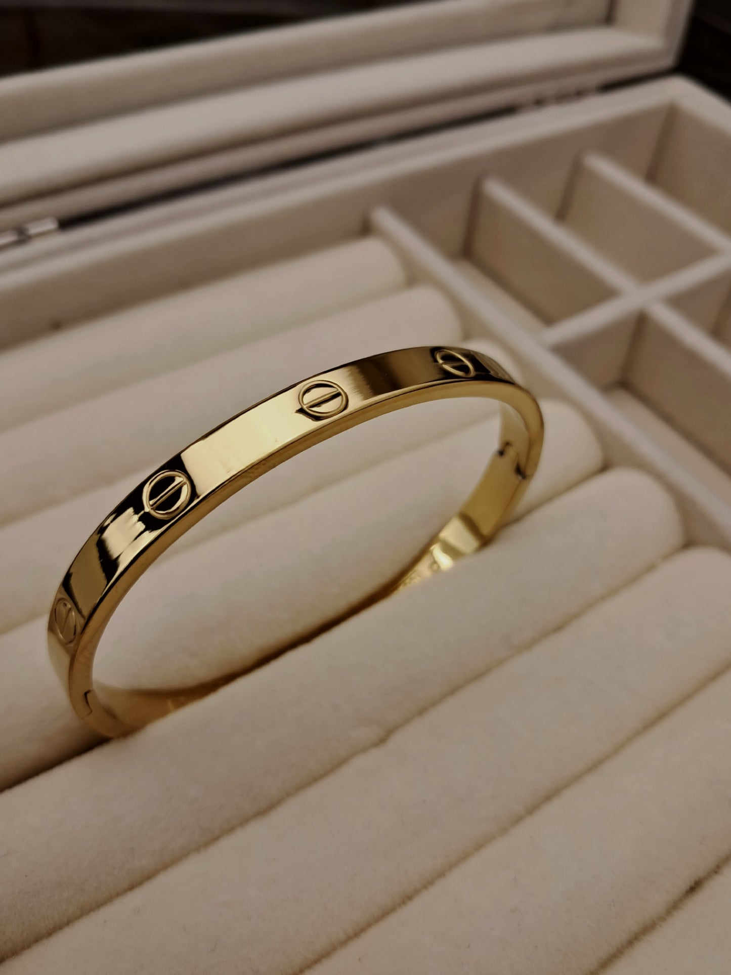 cartier stainless steel bracelet - gold
