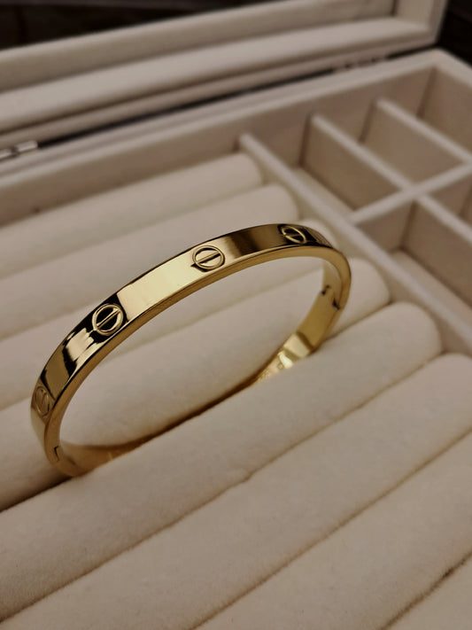 cartier stainless steel bracelet - gold