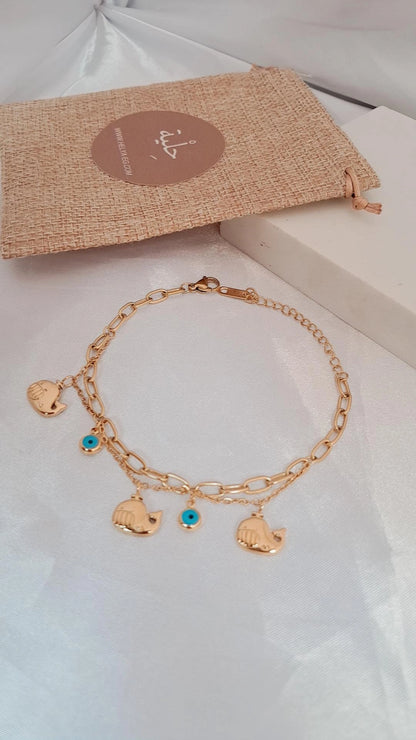 Stainless steel bracelet with five charm - gold