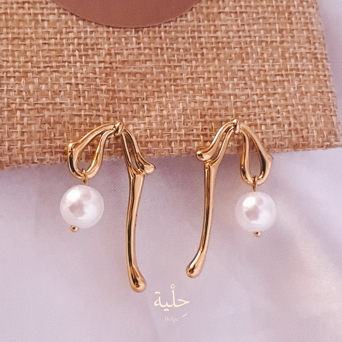 Stainless steel earing with Pearls - gold